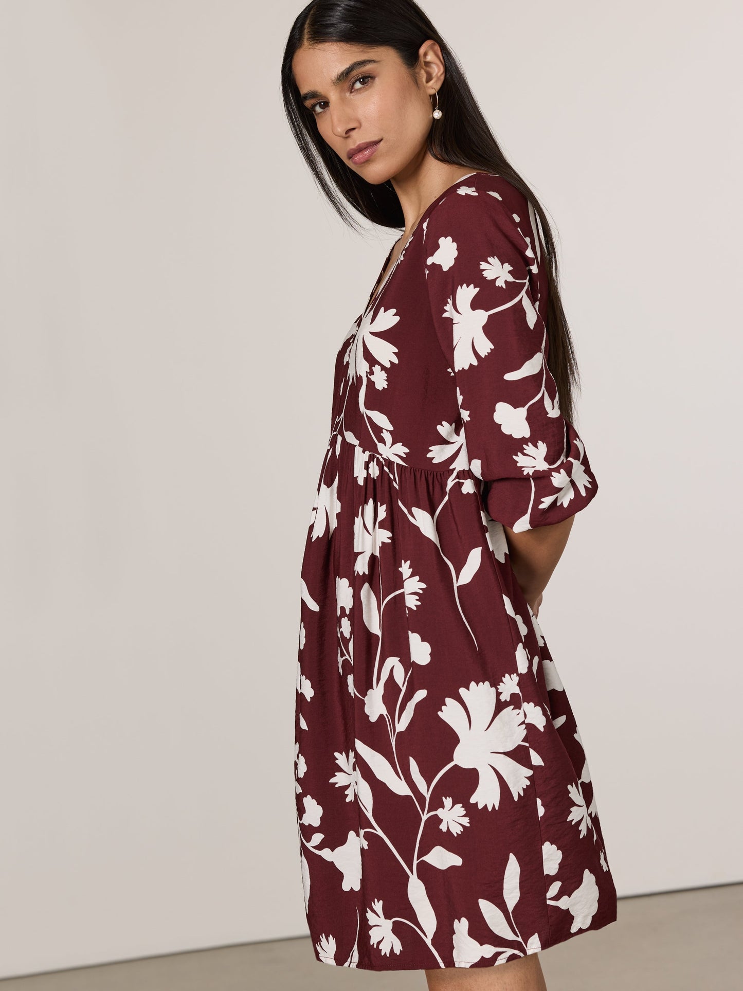 Long-Sleeve V-Neck Empire-Cut Mini Dress